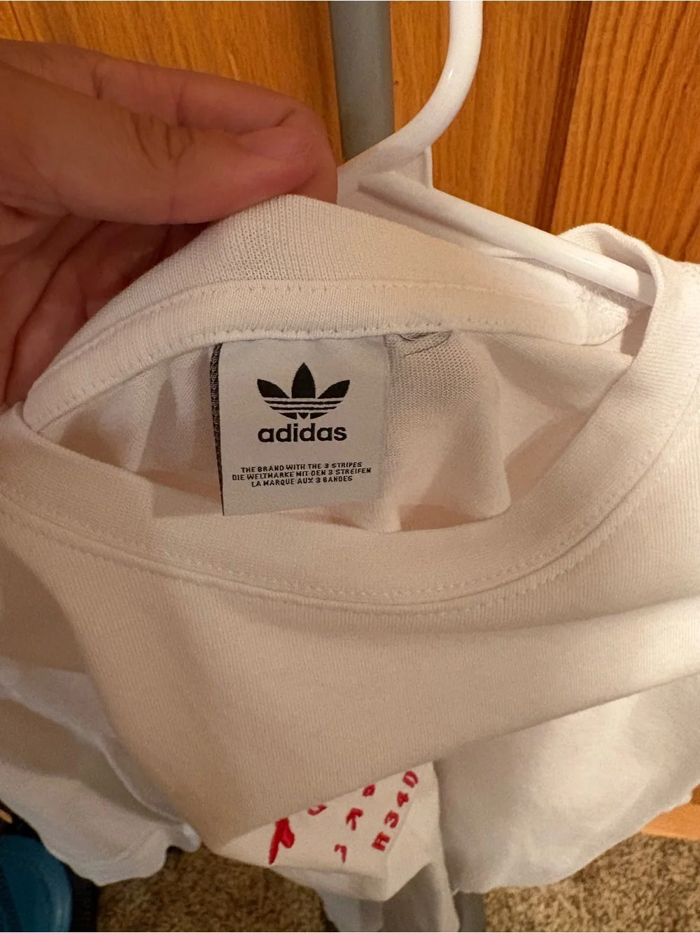 adidas White Short-Sleeve Tee with Red Script Logo